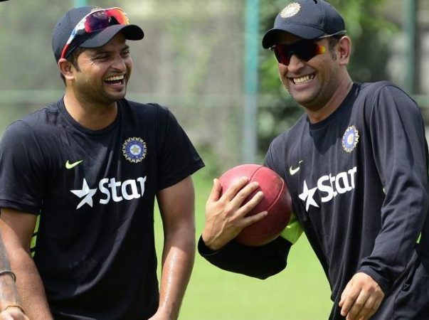 Dhoni and Raina during practice