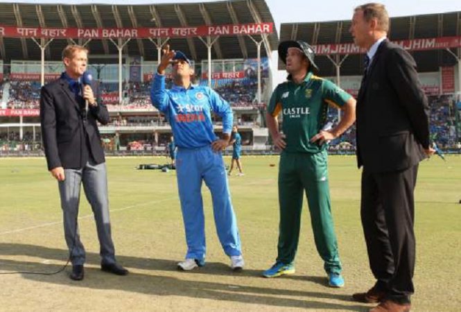 Dhoni at  the toss