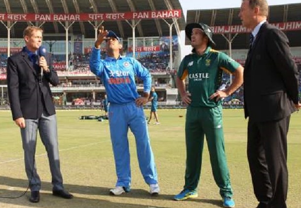 Dhoni at  the toss