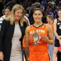 CHICAGO, ILLINOIS - JULY 10: Kelsey Plum #10 of Team Wilson is presented with the MVP trophy during the 2022 AT&T WNBA All-Star Game at the Wintrust Arena on July 10, 2022 in Chicago, Illinois. (Photo by Stacy Revere/Getty Images)