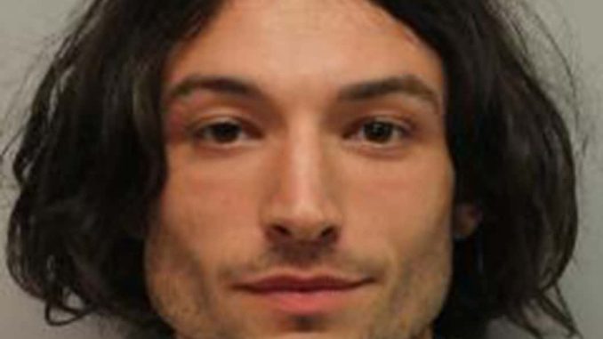 (EDITORS NOTE: Best quality available) In this handout image provided by  Hawaiʻi Police Department, Ezra Miller is seen in a police booking photo after his arrest for disorderly conduct and harassment on March 28, 2022 in Hilo, Hawaii.