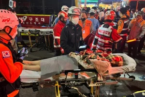 South Korea in shock and grieving after 153 die in Halloween crowd surge