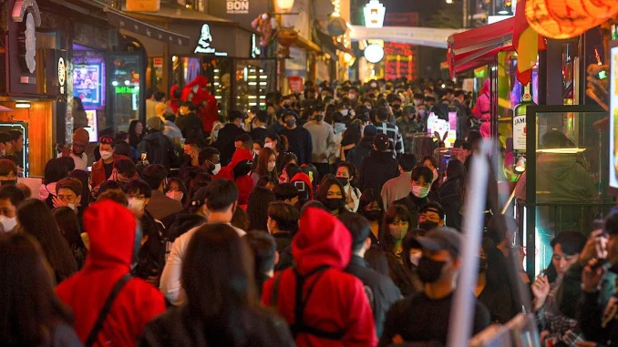 South Korea in shock and grieving after 153 die in Halloween crowd surge
