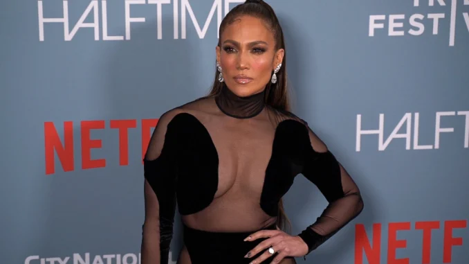 Photos: Jennifer Lopez Slips Into Lace Bra and Silk Pajamas for ‘Writing Session’