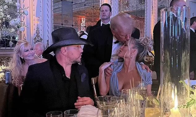 Donald Trump Kisses Jason Aldean's Wife On NYE, Gets Mocked