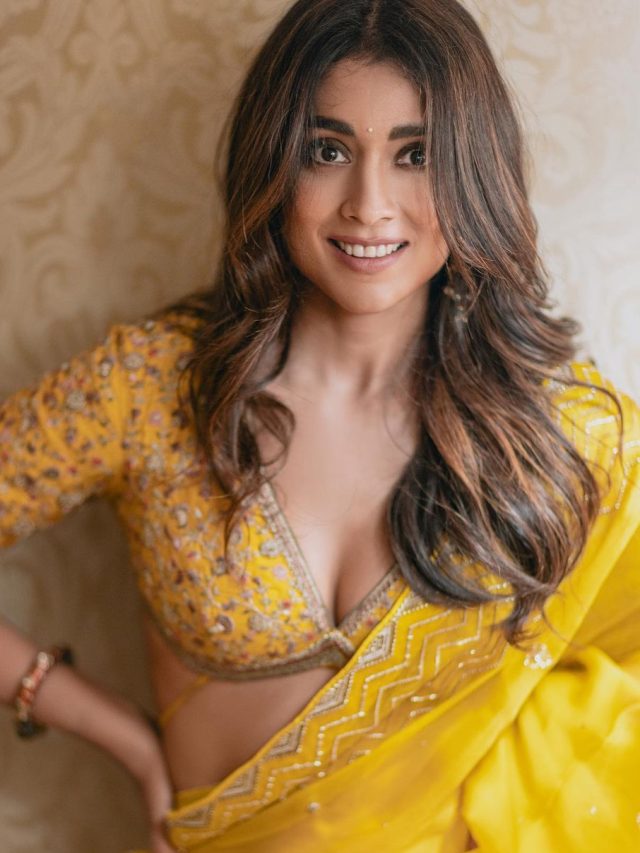 Shriya Saran Is A Sight For Sore Eyes In Vibrant Yellow Saree With Revealing Blouse