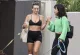 Abbie Chatfield flaunts her cleavage in a crop top as she heads out for a morning walk