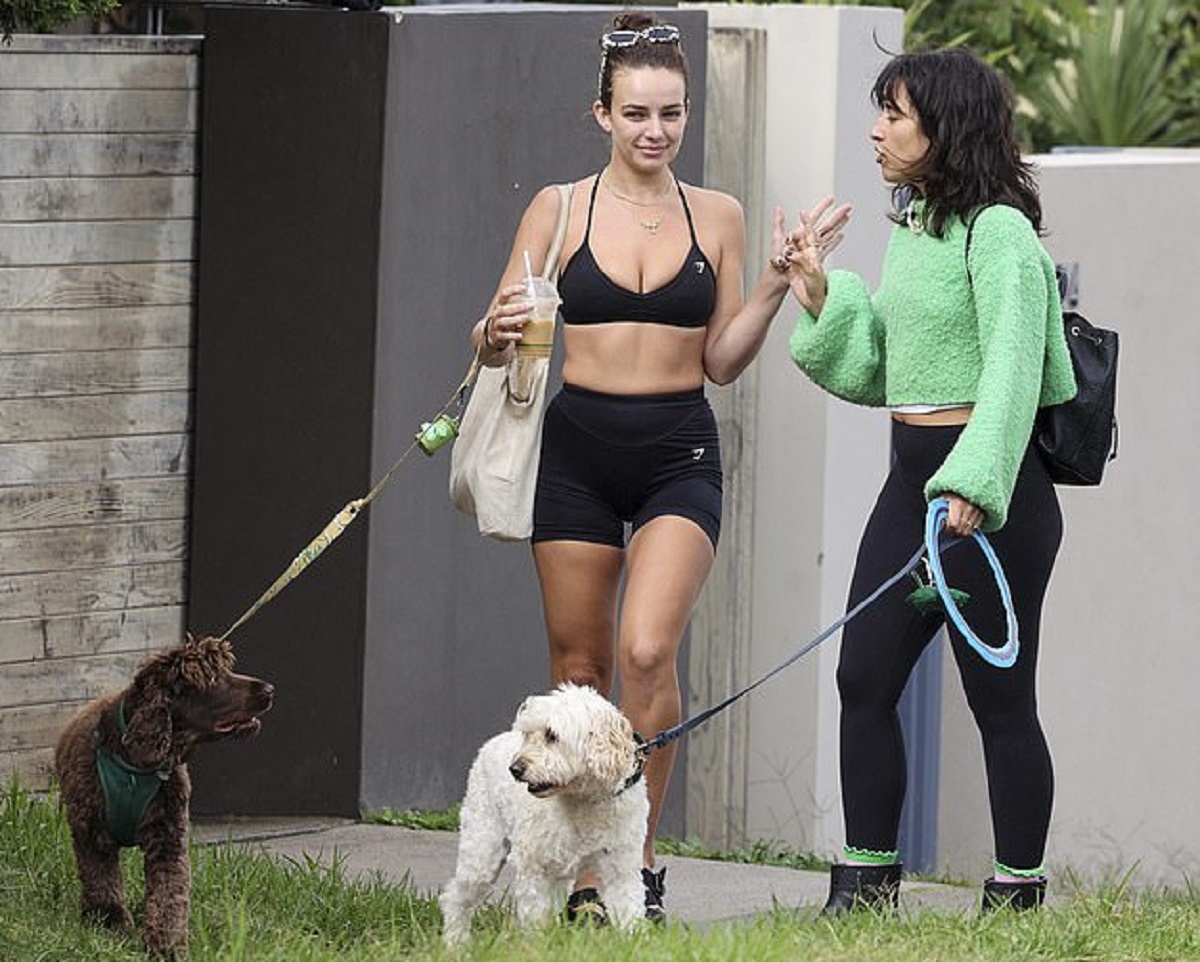 Abbie Chatfield flaunts her cleavage in a crop top as she heads out for a morning walk