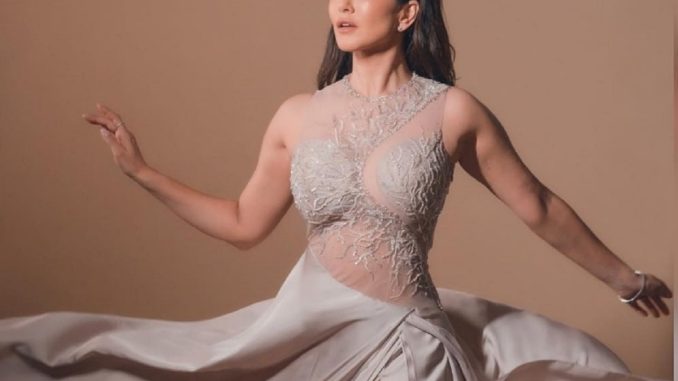 Sunny Leone dazzles in a silver satin gown with sparkly embroidery for her Cannes debut