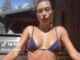 Hailey Bieber Takes a Cold Plunge in a Navy Bikini on TikToksw