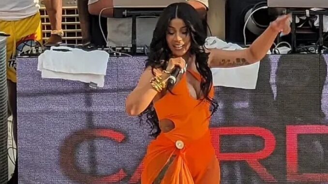 Cardi B's Concert Interrupted as Fan Tosses Drink, Prompting Mic Toss in Response