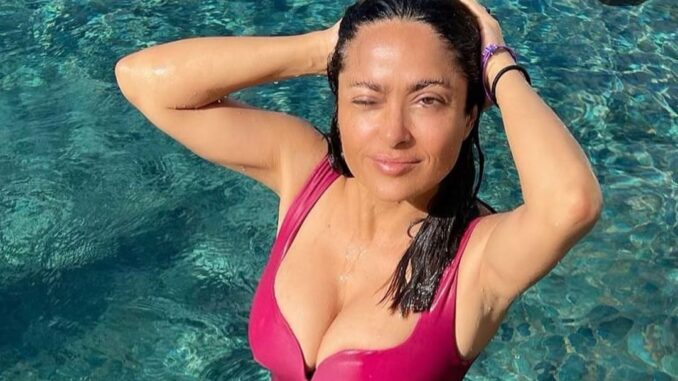 Salma Hayek Pinault Styled as Barbie in a Stunning Hot Pink One-Piece Swimsuit