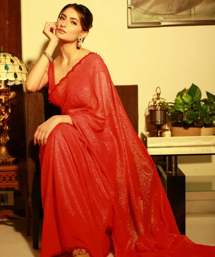 Palak Tiwari, who acted in the latest Salman Khan movie, embraced Christmas with a series of stunning saree looks