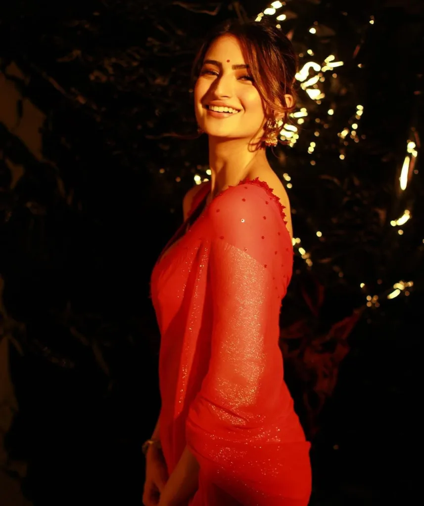 Palak Tiwari, embraced Christmas with a series of stunning saree looks