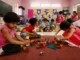 A child's free play time enhances their education by providing them with lower academic burden and holistic development