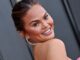 Chrissy Teigen's Daring Plunge: Makeup-Free and Intimate Selfie Moment