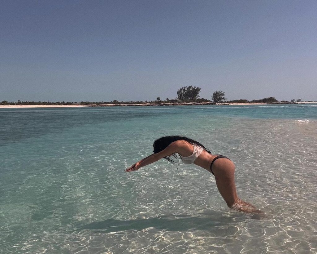 Sexy Pics: Kim Kardashian's Bold Dive Stuns Fans, Sultry Bikini Moment Goes Viral