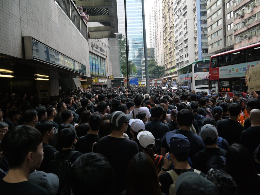 Ethnic group of people moving in street